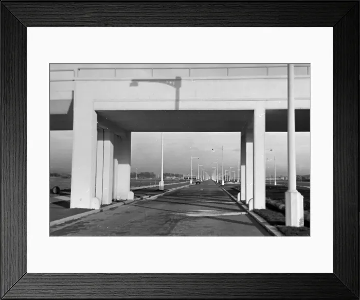 Framed Print : New Road. 17th December 1938: A newly constructed suburban road running Framed Print : New Road. 17th December 1938: A newly constructed suburban road running