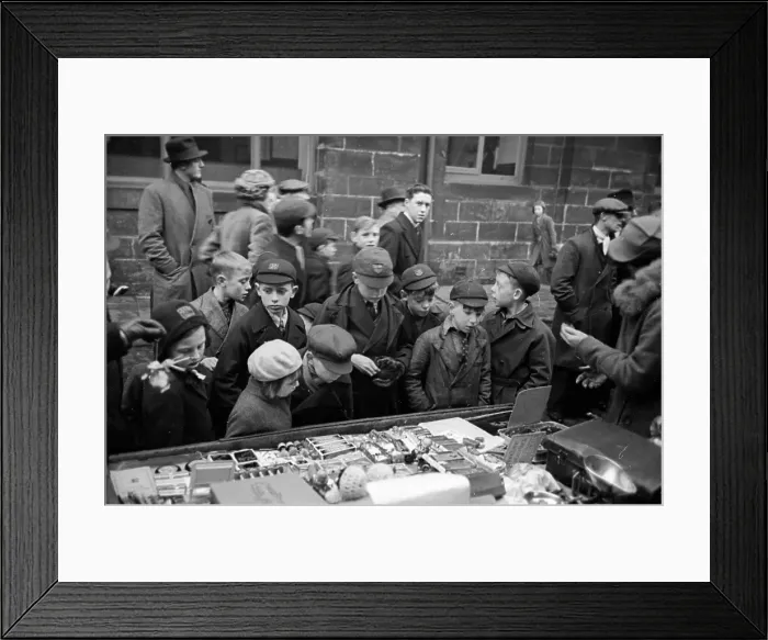 Framed Print : Tuck Shop. 17th December 1938: Children buying penny sweets on a market stall in Newcastle