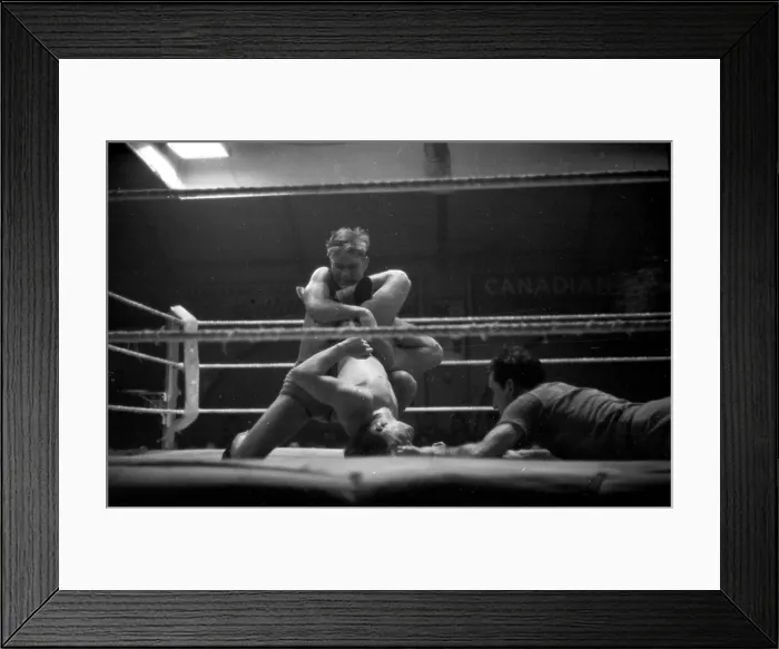 Framed Print : Wrestlers & Refugee Framed Print : Wrestlers & Refugee