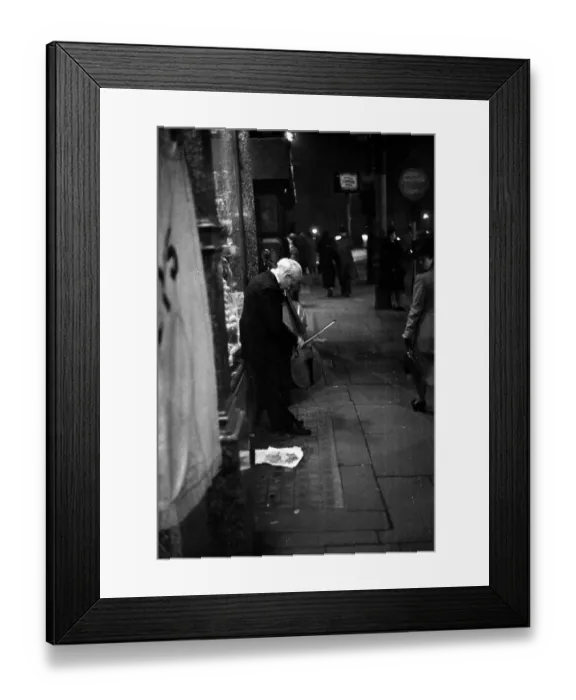 Framed Print : Cellist. 19th November 1938: A cello player in Manchester's Oxford Street Framed Print : Cellist. 19th November 1938: A cello player in Manchester's Oxford Street