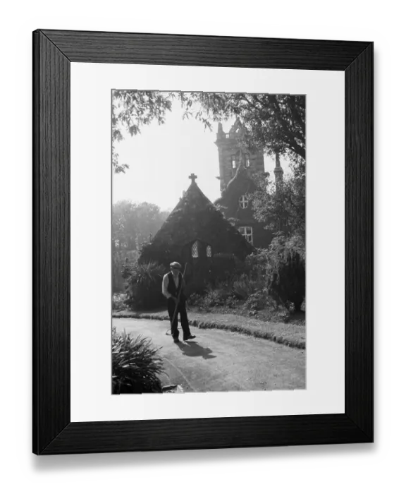 Framed Print : Gardener. 22nd October 1938: A gardener in the Seigneurie which is home Framed Print : Gardener. 22nd October 1938: A gardener in the Seigneurie which is home