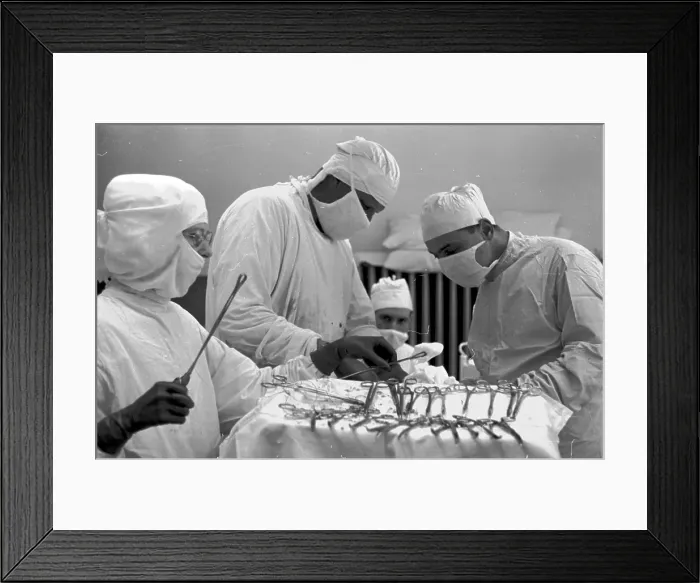 Framed Print : Operation. 1st October 1938: A theatre sister, surgeons Framed Print : Operation. 1st October 1938: A theatre sister, surgeons