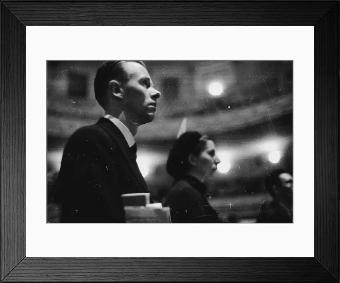 Framed Print : Entranced. 1st October 1938: A member of the audience at a rehearsal for