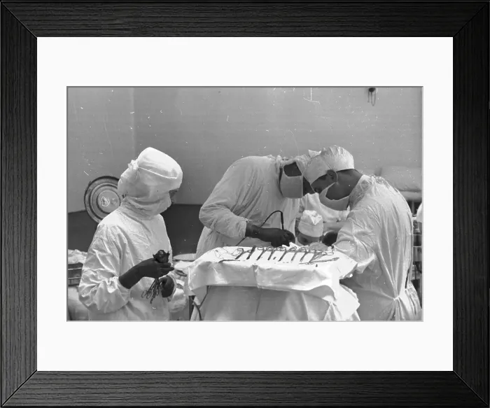 Framed Print : Under The Knife