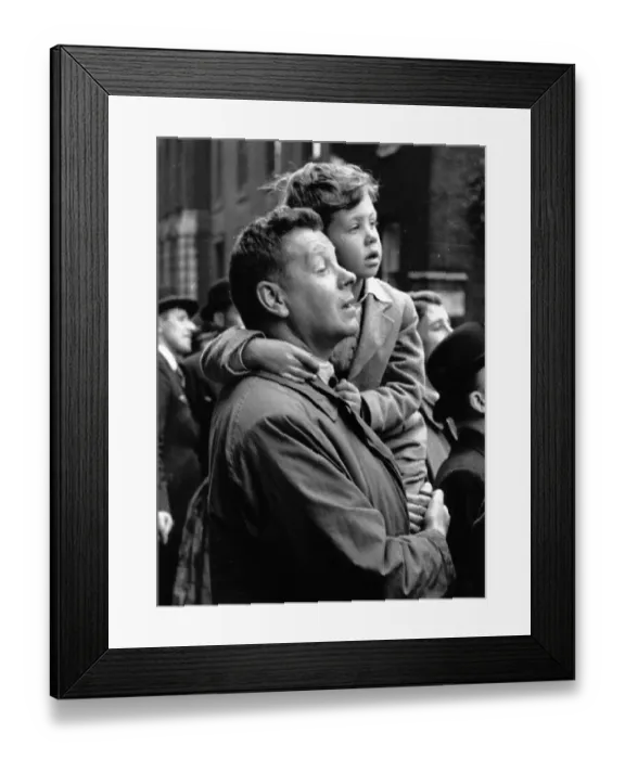 Framed Print : Man Holds Boy