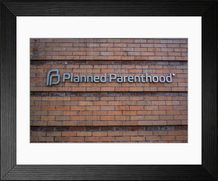 Framed Print : Bill Tompkins Planned Parenthood signage Archive