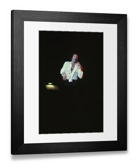Framed Print : Tom Jones. LOS ANGELES - CIRCA 1975: Welsh singer Tom Jones performs live Framed Print : Tom Jones. LOS ANGELES - CIRCA 1975: Welsh singer Tom Jones performs live