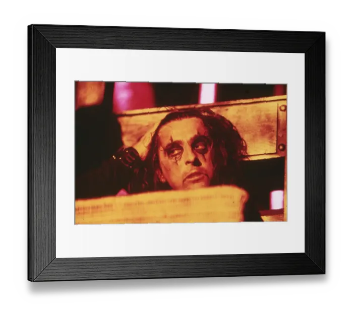 Framed Print : Alice Cooper with his head in a guillotine Framed Print : Alice Cooper with his head in a guillotine