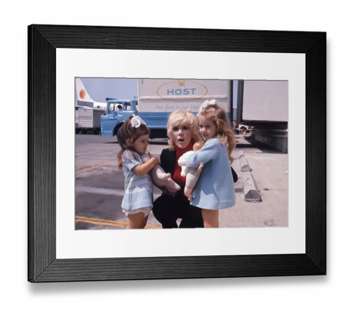 Framed Print : Connie Stevens Attends an Event with her Daughters