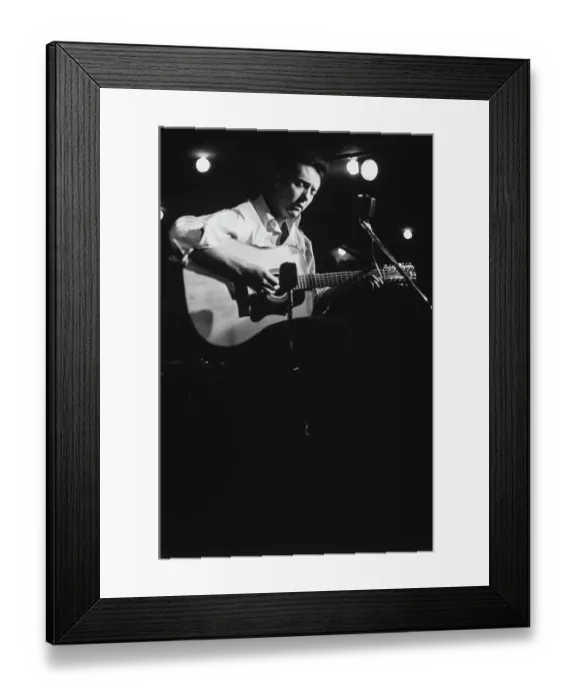Framed Print : Fred Neil. American folk singer Fred Neil (1936 - 2001) performs at the Framed Print : Fred Neil. American folk singer Fred Neil (1936 - 2001) performs at the