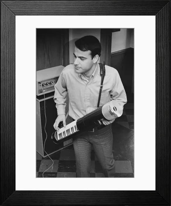 Framed Print : Tubon. An unspecified musician wearing a shirt that is open at the collar Framed Print : Tubon. An unspecified musician wearing a shirt that is open at the collar