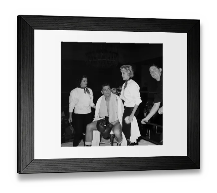Framed Print : Boxing. LOS ANGELES, CA - CIRCA 1957: A view of two women help support Framed Print : Boxing. LOS ANGELES, CA - CIRCA 1957: A view of two women help support
