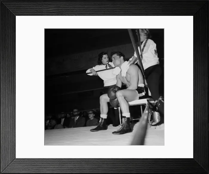 Framed Print : Boxing. LOS ANGELES, CA - CIRCA 1957: A view of two women help support Framed Print : Boxing. LOS ANGELES, CA - CIRCA 1957: A view of two women help support
