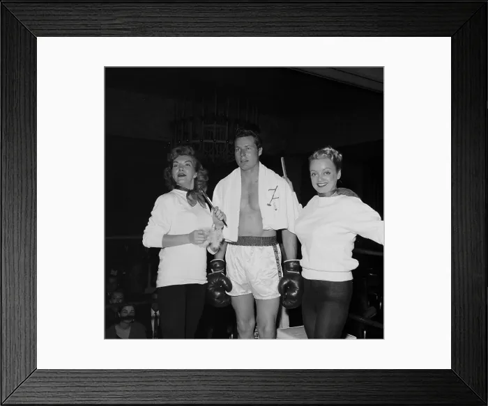 Framed Print : Boxing. LOS ANGELES, CA - CIRCA 1957: A view of two women help support Framed Print : Boxing. LOS ANGELES, CA - CIRCA 1957: A view of two women help support