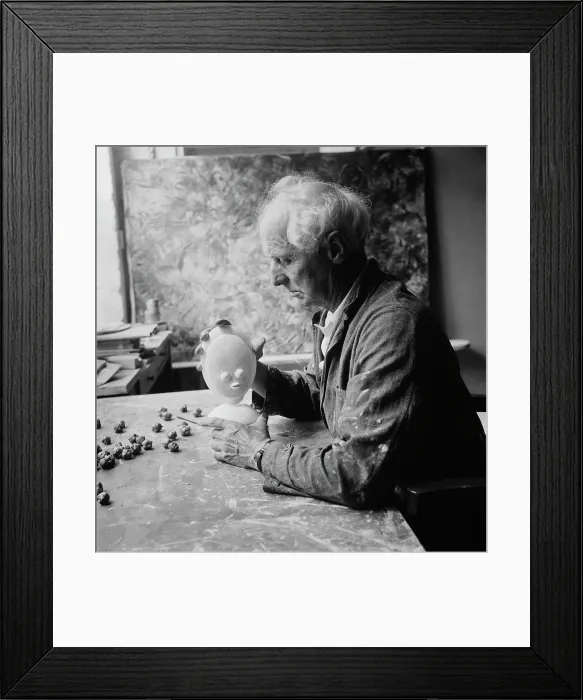 Framed Print : Max Ernst. German artist Max Ernst (1891 - 1976) with a small sculpture in France Framed Print : Max Ernst. German artist Max Ernst (1891 - 1976) with a small sculpture in France