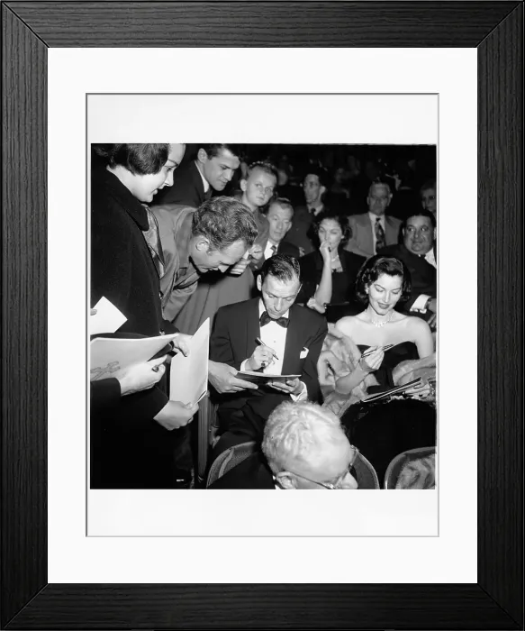 Framed Print : Couple Signs Autographs At Premier Of Pandora and the Flying Dutchman Framed Print : Couple Signs Autographs At Premier Of Pandora and the Flying Dutchman