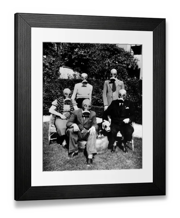 Framed Print : Gas Masks. BERLIN, GERMANY - 1940: An American family Framed Print : Gas Masks. BERLIN, GERMANY - 1940: An American family