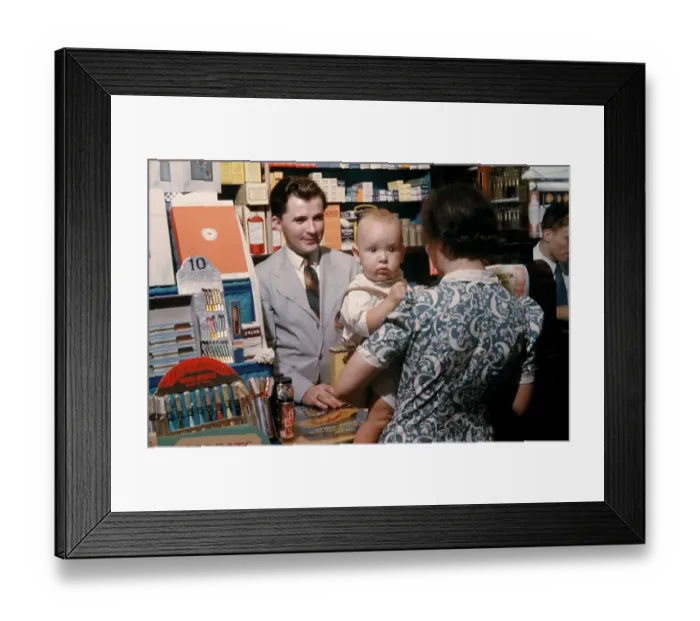 Framed Print : Pharmacy. NEW YORK - SEPTEMBER 1941: A Pharmacist serves customers in September Framed Print : Pharmacy. NEW YORK - SEPTEMBER 1941: A Pharmacist serves customers in September