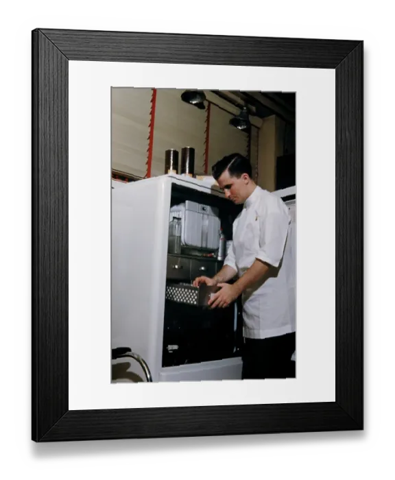 Framed Print : Pharmacy. NEW YORK - SEPTEMBER 1941: A Pharmacist prepares a prescription Framed Print : Pharmacy. NEW YORK - SEPTEMBER 1941: A Pharmacist prepares a prescription