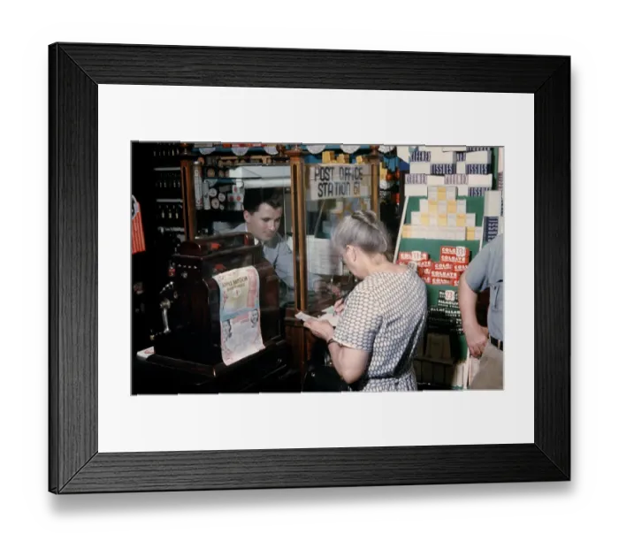 Framed Print : Pharmacy. NEW YORK - SEPTEMBER 1941: A Pharmacist serves customers in September Framed Print : Pharmacy. NEW YORK - SEPTEMBER 1941: A Pharmacist serves customers in September