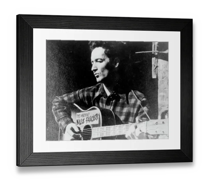 Framed Print : Woody Guthrie Portrait With Guitar Framed Print : Woody Guthrie Portrait With Guitar