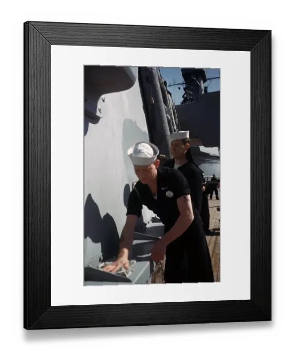 Framed Print : USS Iowa. ATLANTIC OCEAN - 1943: Sailors clean the walls on the deck of Framed Print : USS Iowa. ATLANTIC OCEAN - 1943: Sailors clean the walls on the deck of