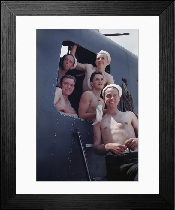 Framed Print : USS Iowa. ATLANTIC OCEAN - 1943: Sailors pose outside a gun turret on the Framed Print : USS Iowa. ATLANTIC OCEAN - 1943: Sailors pose outside a gun turret on the