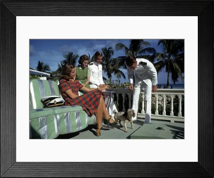 Framed Print : KEY WEST, FL - CIRCA 1946: A view as two navy sailors with girls play with Framed Print : KEY WEST, FL - CIRCA 1946: A view as two navy sailors with girls play with