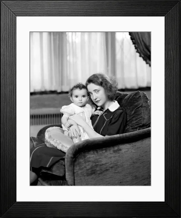 Framed Print : Cab Calloway's Child On A Woman's Lap Framed Print : Cab Calloway's Child On A Woman's Lap