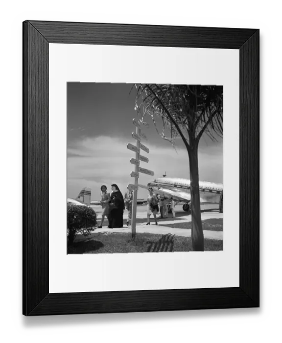 Framed Print : Pan Am. CIRCA 1947: Passengers exit a Pan American Airways clipper circa 1947 Framed Print : Pan Am. CIRCA 1947: Passengers exit a Pan American Airways clipper circa 1947