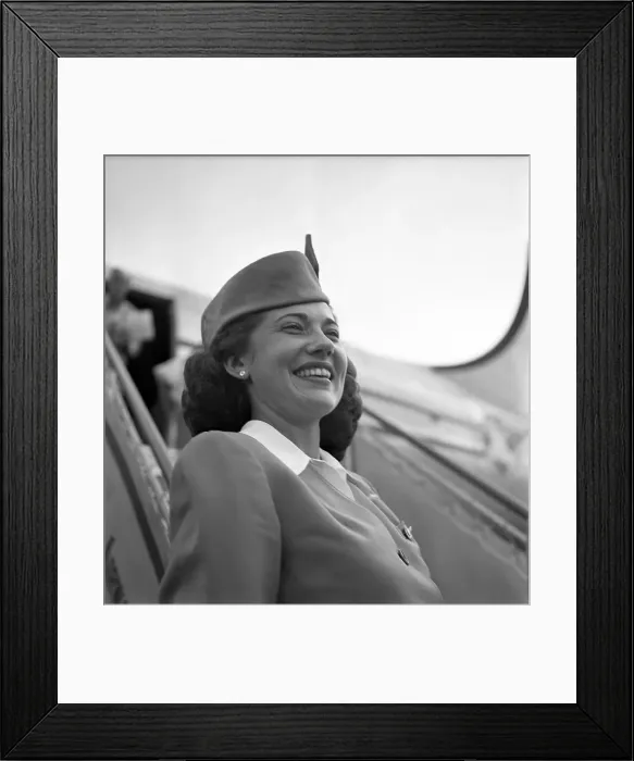 Framed Print : Pan Am. SAN JUAN, PUERTO RICO - CIRCA 1947: A Pan American Airways Stewardess Framed Print : Pan Am. SAN JUAN, PUERTO RICO - CIRCA 1947: A Pan American Airways Stewardess