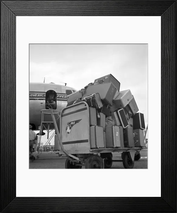 Framed Print : Pan Am. SAN JUAN, PUERTO RICO - CIRCA 1947: Luggage is loaded on a Pan Framed Print : Pan Am. SAN JUAN, PUERTO RICO - CIRCA 1947: Luggage is loaded on a Pan