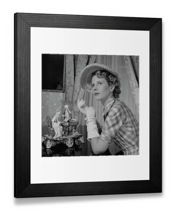 Framed Print : Très Chic. A female model wearing a checked outfit with white evening gloves Framed Print : Très Chic. A female model wearing a checked outfit with white evening gloves