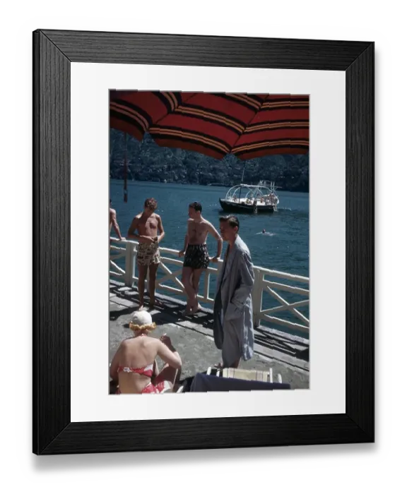 Framed Print : LAKE COMO. LOMBARDY, ITALY - AUGUST 16, 1948: A view of sunbathers Framed Print : LAKE COMO. LOMBARDY, ITALY - AUGUST 16, 1948: A view of sunbathers