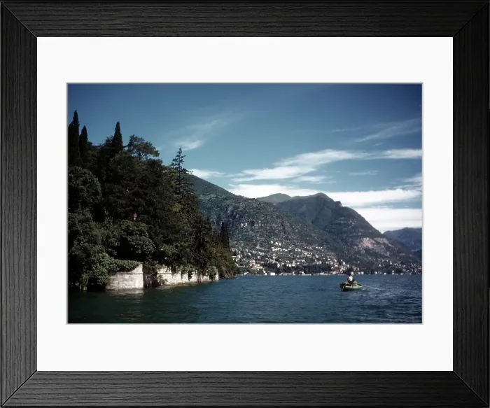 Framed Print : LAKE COMO. LOMBARDY, ITALY - AUGUST 16, 1948: A scenic view of Lake Como in Lombardy Framed Print : LAKE COMO. LOMBARDY, ITALY - AUGUST 16, 1948: A scenic view of Lake Como in Lombardy