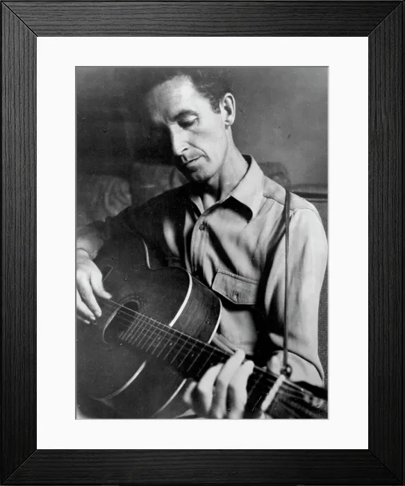 Framed Print : Woody Guthrie Portrait With Guitar Framed Print : Woody Guthrie Portrait With Guitar