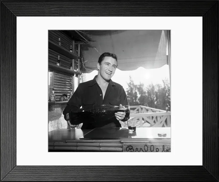 Framed Print : Merv Griffin Pours A Giant Coke Bottle Framed Print : Merv Griffin Pours A Giant Coke Bottle
