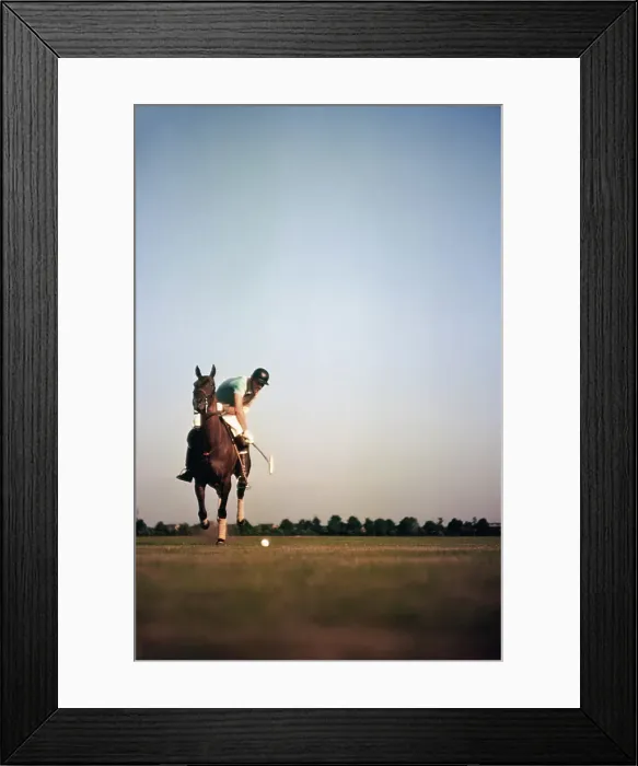 Framed Print : PONY CLUB. UNIONVILLE, PA - CIRCA 1958: A rider swings his polo mallet Framed Print : PONY CLUB. UNIONVILLE, PA - CIRCA 1958: A rider swings his polo mallet