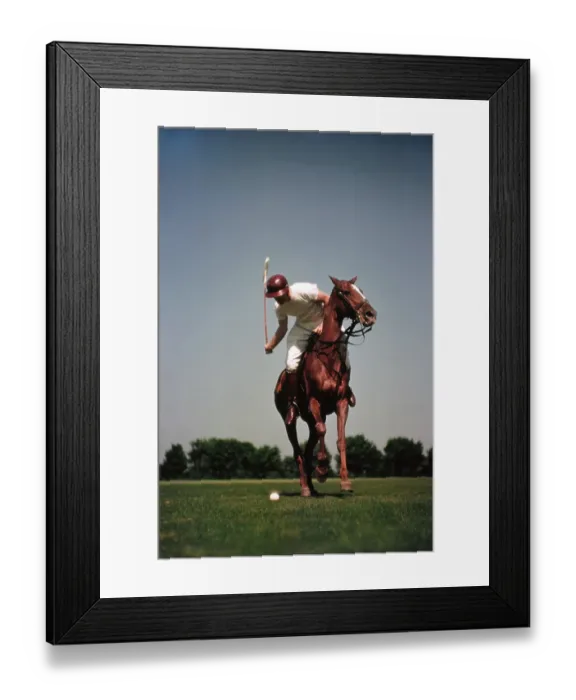 Framed Print : PONY CLUB. UNIONVILLE, PA - CIRCA 1958: A rider swings his polo mallet Framed Print : PONY CLUB. UNIONVILLE, PA - CIRCA 1958: A rider swings his polo mallet