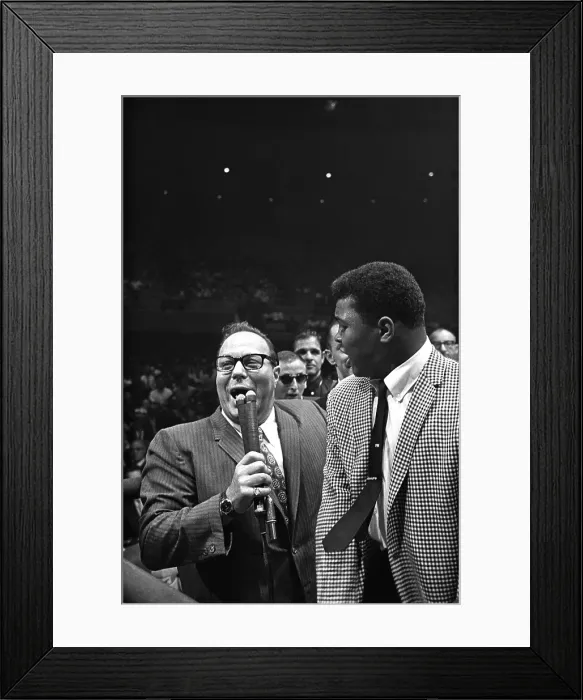 Framed Print : LAS VEGAS, NV - JULY 22: Heavyweight contender Cassius Clay (later known as Muhammad Ali) attempts to get to the ring to taunt Sonny Liston who has just defeated former champion Floyd Patterson to retain his heavyweight crown) on July 22 Framed Print : LAS VEGAS, NV - JULY 22: Heavyweight contender Cassius Clay (later known as Muhammad Ali) attempts to get to the ring to taunt Sonny Liston who has just defeated former champion Floyd Patterson to retain his heavyweight crown) on July 22