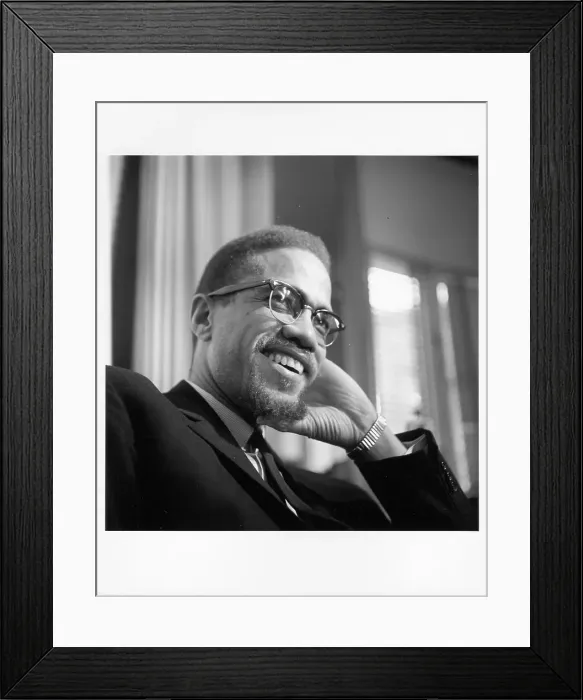 Framed Print : Malcolm X. ROCHESTER, NY - FEBRUARY 16: Former Nation Of Islam leader El-Hajj