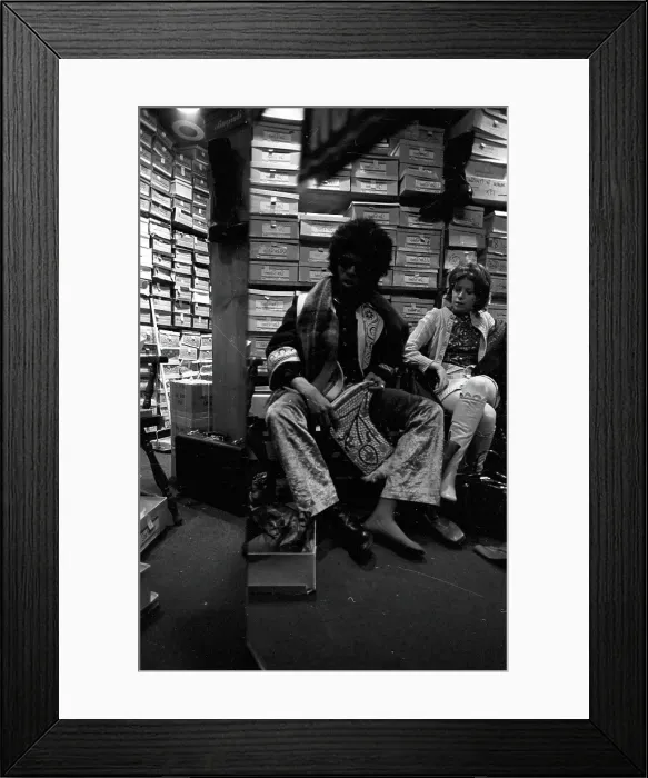 Framed Print : Sly Stone Tries On Boots Framed Print : Sly Stone Tries On Boots