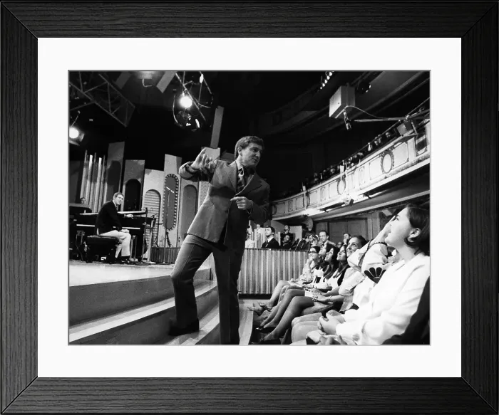 Framed Print : Merv Griffin Fluffs His Audience Before The Show Framed Print : Merv Griffin Fluffs His Audience Before The Show