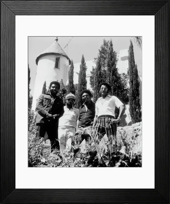 Framed Print : Four Tops Portrait With A Windmill