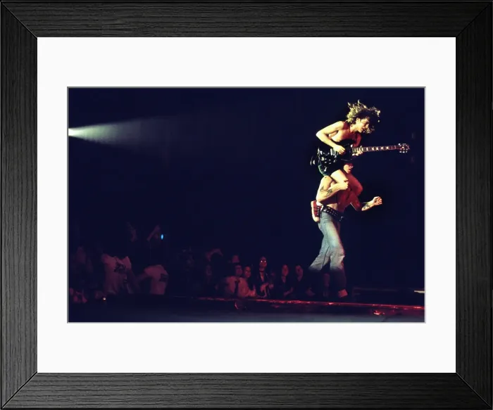 Framed Print : Bon Scott And Angus Young Of AC / DC Framed Print : Bon Scott And Angus Young Of AC / DC