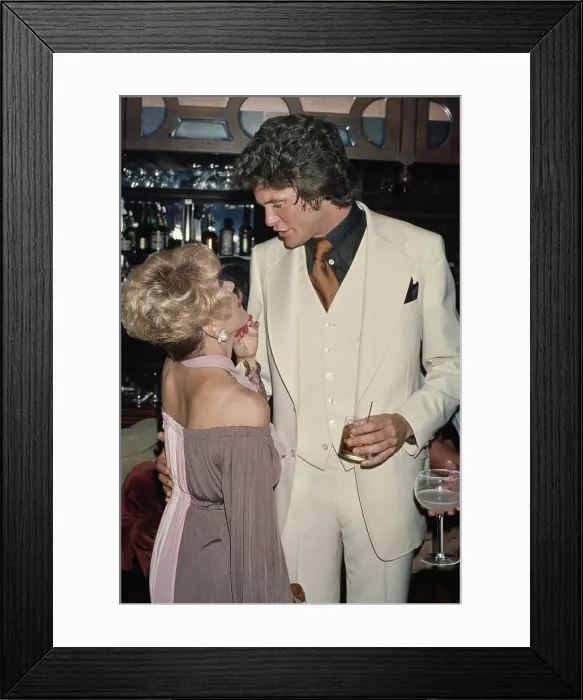 Framed Print : Rona Barrett And David Hasselhoff Attend Pips Disco And Backgammon Club