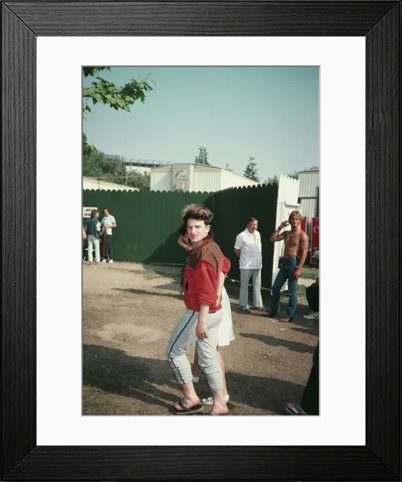 Framed Print : Bono. Irish singer and songwriter Bono of rock band U2 at a music event, June 1983 Framed Print : Bono. Irish singer and songwriter Bono of rock band U2 at a music event, June 1983
