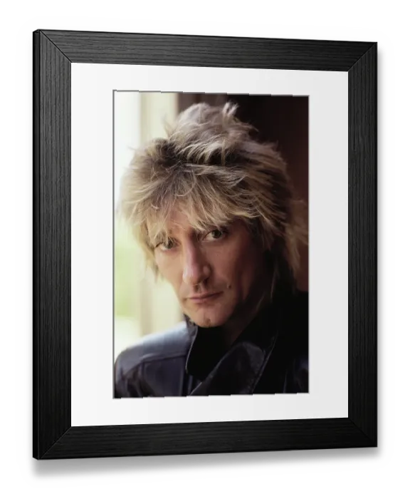 Framed Print : Portrait. LOS ANGELES - DECEMBER 1983: Rock singer Rod Stewart poses for Framed Print : Portrait. LOS ANGELES - DECEMBER 1983: Rock singer Rod Stewart poses for