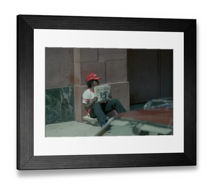 Framed Print : 1984 Summer Olympics - Newspaper Seller Framed Print : 1984 Summer Olympics - Newspaper Seller
