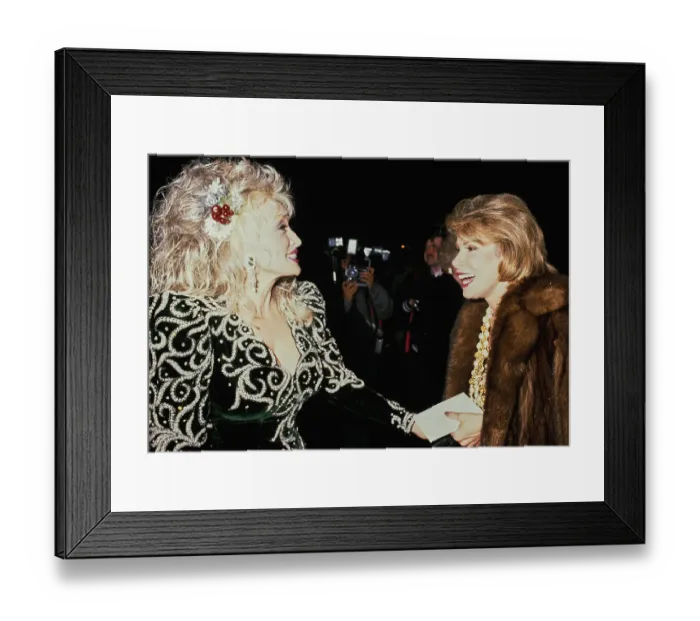 Framed Print : Dolly Parton And Joan Rivers Attend Sandy Gallin's Christmas Party Framed Print : Dolly Parton And Joan Rivers Attend Sandy Gallin's Christmas Party